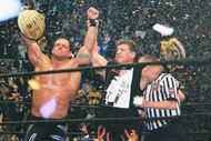 Benoit and Eddie celebrating in one of the greatest WrestleMania moments.